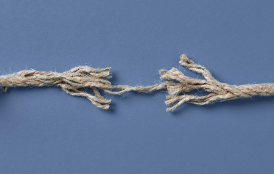 A thread separated into two. Davis Law Firm is skilled in assisting couples with legal separation.